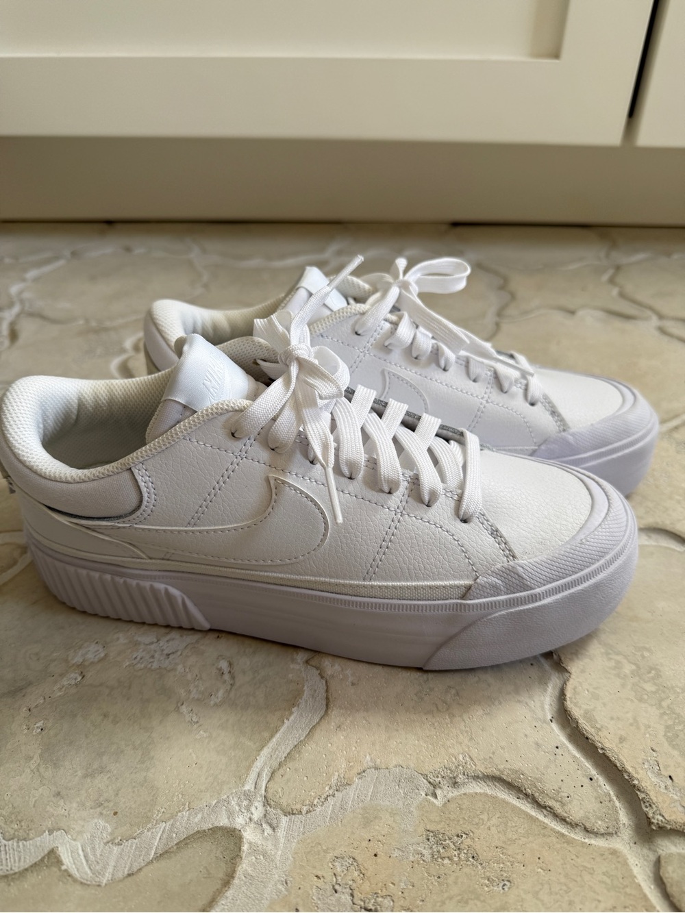Nike Women's All-White Platform Skate Sneakers